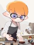  1boy amedama_893 apron baking_sheet black_apron blue_eyes blush bowl chocolate closed_mouth commentary_request dot_nose eating glass highres holding holding_spoon indoors inkling_boy inkling_player_character kitchen orange_hair pointy_ears short_hair smallfry_(splatoon) solo splatoon_(series) splatoon_3 spoon standing sweat sweater white_sweater wooden_spoon 