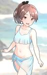  1girl bikini blue_bikini blue_sarong blurry blurry_background blush brown_eyes brown_hair collarbone commentary_request furaggu_(frag_0416) highres kantai_collection long_hair looking_at_viewer navel ocean outdoors ponytail sarong shikinami_(kancolle) solo standing swimsuit 