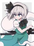  1girl black_hairband black_ribbon border green_eyes green_skirt green_vest grey_background grey_hair hairband highres katana konpaku_youmu kurachi_mizuki long_eyelashes looking_ahead puffy_short_sleeves puffy_sleeves ribbon short_hair short_sleeves skirt smile solo sword touhou vest weapon white_border youmu_day 