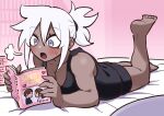  1girl :o absurdres bare_shoulders barefoot bed_sheet bedroom blush breasts breath cleavage dark-skinned_female dark_skin feet_out_of_frame flow_(kanke_(kank06020602)) gradient_background grey_eyes highres kanke_(kank06020602) kneepits long_bangs lying magazine_(object) medium_breasts on_bed on_stomach open_mouth original pink_background reading shiny_skin soles solo sweatdrop the_pose tongue 