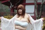  1girl asian breasts brown_hair cleavage fat fundoshi huge_breasts luu_(cosplayer) photo solo 