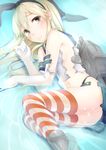 bad_id bad_pixiv_id black_eyes blonde_hair blush elbow_gloves gloves hairband kantai_collection long_hair navel partially_submerged sakasa_(guranyto) shimakaze_(kantai_collection) solo striped striped_legwear tears thighhighs torn_clothes water white_gloves 