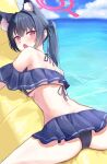  1girl :o absurdres animal_ear_fluff animal_ears ass back banana_boat bare_shoulders bikini black_bikini blue_archive blue_ribbon blush breasts cat_ears cat_girl clenched_hand commentary cowboy_shot day dutch_angle embarrassed extra_ears fang frilled_bikini frills from_behind fujiwara_haru_(nekonote) furrowed_brow hair_between_eyes hair_intakes hair_ribbon halo highres long_hair looking_at_viewer looking_back lying ocean off-shoulder_bikini off_shoulder official_alternate_costume on_stomach open_mouth outdoors pink_halo red_eyes red_pupils ribbon serika_(blue_archive) serika_(swimsuit)_(blue_archive) sidelocks skin_fang skindentation slit_pupils small_breasts solo spread_legs straight_hair swimsuit tsurime twintails 