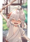  1boy aged_down antenna_hair arm_up blurry blurry_background child closed_eyes commentary_request crossed_bangs facing_viewer genshin_impact grey_hair grey_kimono hair_between_eyes highres holding holding_sword holding_weapon japanese_clothes kaedehara_kazuha kimono kuro_tsubasa male_focus multicolored_hair open_mouth red_streaks short_hair short_sleeves smile solo streaked_hair sword upper_body weapon wooden_sword 