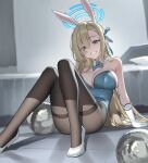  1girl absurdres asuna_(blue_archive) asuna_(bunny)_(blue_archive) asymmetrical_bangs blonde_hair blue_archive blue_bow blue_bowtie blue_eyes blue_halo blue_leotard bow bowtie breasts cleavage gloves hair_over_one_eye halo highres indoors large_breasts leotard long_hair looking_at_viewer official_alternate_costume pantyhose playboy_bunny sitting strapless strapless_leotard thighband_pantyhose traditional_bowtie white_gloves xzu 