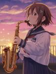  1girl blue_sailor_collar blue_skirt blush brown_eyes brown_hair cloud cloudy_sky evening from_side gradient_sky hair_ornament hairclip highres instrument mountain neckerchief nodai_musashi original outdoors oversized_clothes playing_instrument pleated_skirt red_neckerchief rooftop sailor_collar saxophone school_uniform serafuku shirt sideways_glance skirt sky solo sparkle sunset undershirt white_shirt 