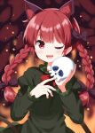  1girl animal_ears blush bow bowtie braid cat_ears cat_tail commentary_request dress extra_ears green_dress hair_bow highres holding holding_skull juliet_sleeves kaenbyou_rin long_hair long_sleeves looking_at_viewer multiple_hair_bows multiple_tails nekomata one_eye_closed open_mouth puffy_sleeves red_bow red_bowtie red_eyes red_hair ruu_(tksymkw) skull smile solo tail touhou twin_braids two_tails upper_body 