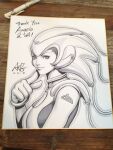  1girl breasts cleavage_cutout clothing_cutout commentary english_commentary from_side gloves helmet marker_(medium) monochrome pepper_(artgerm) pepper_project photo_(medium) shikishi signature sketch smile solo stanley_lau traditional_media turning_head upper_body 