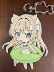  1girl animal_ears bare_arms bare_shoulders barefoot bikini blue_eyes bow brown_hair cat_ears cat_girl cat_tail charm_(medium) chibi commentary_request eyebrows_hidden_by_hair food food_in_mouth frilled_bikini frills hair_bow highres holding innertube long_hair mouth_hold original photo_(medium) popsicle popsicle_in_mouth solo swim_ring swimsuit tail tail_bow tail_ornament tantan_men_(dragon) very_long_hair watermelon_bar white_bikini white_bow 