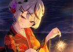  1girl absurdres beach black_streaks breasts brown_eyes commentary_request fireworks floral_print floral_print_kimono flower grin hair_flower hair_ornament hairclip highres holding holding_fireworks hololive japanese_clothes kimono multicolored_hair print_kimono purple_flower red_flower red_nails sakamata_chloe smile solo streaked_hair takotakochan_1006 upper_body virtual_youtuber white_hair wide_sleeves 