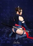  1girl ass high_heels katana kneeling long_boots marvel photo psylocke short_hair solo sword weapon x-men yaya_han 