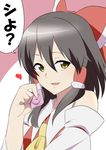  ascot black_hair bow condom condom_wrapper detached_sleeves hair_bow hair_tubes hakurei_reimu heart holding holding_condom jeno ribbon solo touhou translated yellow_eyes 