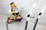  1girl asian blonde_hair breasts brown_eyes chouzuki_maryou cosplay drill_hair fingerless_gloves gloves gun hat large_breasts magical_musket mahou_shoujo_madoka_magica musket photo plump solo tomoe_mami tomoe_mami_(cosplay) twin_drills weapon 