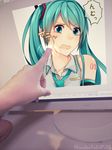  aqua_eyes aqua_hair cheek_poking detached_sleeves fourth_wall hatsune_miku long_hair monitor necktie open_mouth poking through_screen twintails twitter_username vocaloid wakatsuki_you 