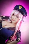  1girl breasts cosplay headphones k-a-n-a large_breasts nitroplus photo pink_eyes pink_hair police police_uniform policewoman super_sonico super_sonico_(cosplay) uniform 