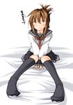  black_legwear brown_eyes brown_hair folded_ponytail hair_ornament highres inazuma_(kantai_collection) kaminagi_(kaminagi-tei) kantai_collection kneehighs looking_at_viewer on_bed pleated_skirt school_uniform serafuku short_hair sitting skirt solo translated 