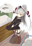  adapted_costume amatsukaze_(kantai_collection) ball blush brown_eyes buruma from_above garter_straps gym_storeroom hair_tubes highres iwasaki_takashi jacket kantai_collection long_hair looking_at_viewer looking_up ponytail red_legwear silver_hair solo striped striped_legwear thighhighs track_jacket two_side_up vaulting_horse volleyball 