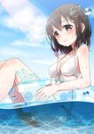  bikini black_hair breasts day haguro_(kantai_collection) hair_ornament highres innertube kantai_collection minimaru short_hair side-tie_bikini small_breasts solo swimsuit white_bikini 