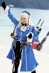  1girl airplane asian atago_(kantai_collection) atago_(kantai_collection)_(cosplay) battleship blonde_hair cannon chouzuki_maryou cosplay gloves gun kantai_collection military military_uniform personification photo plump solo uniform warship weapon 