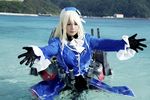  1girl airplane asian atago_(kantai_collection) atago_(kantai_collection)_(cosplay) battleship blonde_hair cannon chouzuki_maryou cosplay gloves gun kantai_collection military military_uniform personification photo plump solo uniform warship weapon 