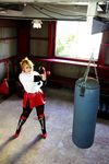  1girl asian blonde_hair blue_eyes boxing_ring breasts chouzuki_maryou cosplay fingerless_gloves gloves large_breasts miss_spencer miss_spencer_(cosplay) photo punching_bag rumble_roses rumble_roses_xx solo 