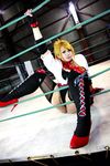  1girl asian blonde_hair blue_eyes boxing_ring breasts chouzuki_maryou cosplay fingerless_gloves gloves large_breasts miss_spencer miss_spencer_(cosplay) photo rumble_roses rumble_roses_xx solo 