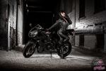  1girl alley batman_(series) boots catwoman catwoman_(cosplay) cosplay dc_comics high_heels highres honda honda_cbr600rr_(pc40) motor_vehicle motorcycle night photo solo vehicle yaya_han 