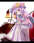  book bow chair crescent crescent_hair_ornament cup desk desk_lamp dress hair_ornament hair_ribbon hat lamp leaning_forward letterboxed long_hair long_sleeves looking_down patchouli_knowledge picture_(object) purple_eyes purple_hair reading ribbon shoes sitting smile solo teacup teapot touhou tress_ribbon yukizumi_remon 