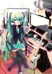  bespectacled cat_slippers chair crossed_legs dress electric_guitar glasses green_eyes green_hair guitar hatsune_miku headphones headphones_around_neck hekicha highres instrument keyboard_(computer) keyboard_(instrument) long_hair looking_at_viewer monitor sitting smile solo thighhighs tissue_box twintails very_long_hair vocaloid 