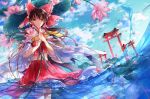  1girl ascot bow brown_hair cloud commentary_request day detached_sleeves flower frilled_bow frilled_hair_tubes frills hair_bow hair_tubes hakurei_reimu holding holding_flower lily_pad long_hair looking_at_viewer multiple_torii own_hands_together red_bow red_skirt skirt skirt_set solo tg torii touhou water water_lily_flower yellow_ascot yellow_eyes 
