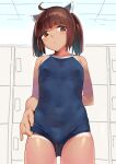  1girl adjusting_clothes adjusting_swimsuit ahoge blue_one-piece_swimsuit blunt_bangs brown_hair commentary_request competition_school_swimsuit flat_chest headgear locker locker_room looking_at_viewer one-piece_swimsuit one-piece_tan red_eyes school_swimsuit shiden_(sashimi_no_wife) short_hair solo swimsuit tan tanlines touhoku_kiritan twintails voiceroid 