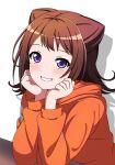  1girl arm_support bang_dream! blush brown_hair commentary_request cone_hair_bun double_bun drop_shadow grin hair_bun hair_ears hands_on_own_cheeks hands_on_own_face head_rest highres hood hood_down hoodie looking_at_viewer medium_hair orange_hoodie purple_eyes seiso-kei_yurufuwa_bishoujo sidelocks simple_background smile solo toyama_kasumi upper_body white_background 