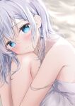  1girl amedamacon bare_shoulders bed_sheet blue_eyes blush braid braided_bangs breasts closed_mouth commentary_request dress feet_out_of_frame grey_dress grey_hair hair_between_eyes highres hugging_own_legs knees_up looking_at_viewer original small_breasts solo strap_slip 