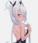  1girl absurdres bare_shoulders blue_archive blush breasts closed_mouth dark-skinned_female dark_skin fake_tail grabbing_own_hair grey_background grey_hair grey_halo hair_over_one_eye halo highres iori_(blue_archive) jun_daniell long_hair looking_at_viewer looking_to_the_side playboy_bunny pointy_ears rabbit_tail red_eyes simple_background solo tail twintails 