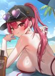  1girl baseball_cap beach beach_towel bikini black_hat blush breasts commentary_request day earrings eyewear_on_headwear hat heart heart-shaped_eyewear heart_earrings heterochromia highres hololive houshou_marine houshou_marine_(summer) huge_breasts jewelry long_hair looking_at_viewer lying ocean official_alternate_costume on_stomach oritonagi outdoors palm_tree ponytail red_bikini red_eyes red_hair ring_light_reflection sand solo swimsuit towel tree untied_bikini_top virtual_youtuber wet yellow_eyes 