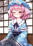  1girl blue_hat blue_kimono blush breasts closed_mouth commentary_request frilled_kimono frills hat highres japanese_clothes kimono long_sleeves medium_breasts medium_hair mob_cap neck_ribbon obi one_eye_closed petal_print pink_eyes pink_hair print_kimono purple_ribbon purple_sash ribbon ribbon-trimmed_collar ribbon-trimmed_sleeves ribbon_trim ruu_(tksymkw) saigyouji_yuyuko sash shadow shouji sitting sleeve_garter sliding_doors smile solo sweat touhou triangular_headpiece wide_sleeves 