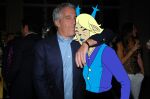 anthro big_ears blonde_hair button_(fastener) candid carol_holiday clothing deer deltarune dress duo exposed eyes_closed female hair horn human humanoid jeffrey_epstein leak male male/female mammal mayor party photo pose standing sweater topwear undertale_(series) villegreen