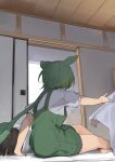  2girls black_hair blanket commentary futon green_hair highres indoors low_ponytail morning morning_after multiple_girls overall_shorts overalls pocche-ex ponytail shirt short_sleeves shouji sitting sliding_doors touhoku_kiritan voicevox waking_up zundamon 