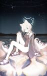  1girl absurdres animal_ear_fluff animal_ears bare_shoulders beach black_jacket black_one-piece_swimsuit black_sandals blue_archive blue_eyes blue_halo blush breasts commentary covered_navel extra_ears grey_hair halo highres jacket looking_at_viewer medium_hair night ocean official_alternate_costume official_alternate_hairstyle one-piece_swimsuit open_clothes open_jacket outdoors ponytail sandals shiroko_(blue_archive) shiroko_(swimsuit)_(blue_archive) sky small_breasts solo swimsuit toes topgu untranslatable_commentary wolf_ears wolf_girl 
