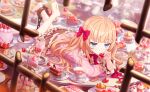  1girl barefoot blonde_hair blue_eyes blurry blurry_foreground bow cake cake_slice cherry commentary_request cup cupcake depth_of_field dress food fork fruit game_asset highres long_hair lying macaron motosu_towa non-web_source official_art on_stomach pastry plate saucer self-datamine solo strawberry strawberry_shortcake table tea teacup teapot tiered_tray world_dai_star 