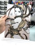  1girl art_tools_in_frame artist's_hand_in_frame bandaged_arm bandages black_eyes black_hair breasts commentary english_commentary from_side highres holding holding_weapon ibuki_(street_fighter) looking_at_viewer marker_(medium) ninja photo_(medium) ponytail sideboob signature solo stanley_lau street_fighter traditional_media turning_head upper_body weapon 