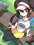  1girl absurdres black_pantyhose blue_eyes blue_shirt blue_shoes bow breasts brown_hair commentary distr donut_hair_bun double_bun english_commentary from_above grass hair_bun highres log long_hair looking_at_viewer looking_up medium_breasts outdoors pantyhose pantyhose_under_shorts pink_bow poke_ball_print pokemon pokemon_black_2_and_white_2 raglan_sleeves rock rosa_(pokemon) shirt shoes shorts sitting smile sneakers solo twintails two-tone_shirt v visor_cap watch white_shirt yellow_shorts 