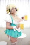  1girl arms_up asian blonde_hair breasts brown_eyes chouzuki_maryou cleavage cosplay dirndl headphones jewelry large_breasts necklace nitroplus photo plump short_hair solo star super_pochaco super_pochaco_(cosplay) thighhighs 