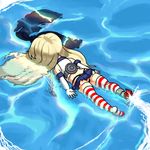  afloat ass blonde_hair commentary elbow_gloves face_down gloves hair_ribbon kantai_collection long_hair panties partially_submerged ribbon shimakaze_(kantai_collection) solo striped striped_legwear thighhighs thong tim_buktu underwear water 