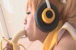  1girl asian banana blonde_hair cosplay food fruit headphones kitamura_hitomi mizuki_tama nitroplus photo super_pochaco super_pochaco_(cosplay) 