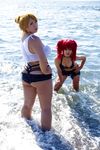  asian ass beach blonde_hair breasts candy_cane_(rumble_roses) candy_cane_(rumble_roses)_(cosplay) chouzuki_maryou cleavage cosplay highres huge_ass miss_spencer miss_spencer_(cosplay) multiple_girls ocean photo plump red_hair rumble_roses rumble_roses_xx solo suzuka_itsuki 
