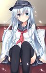  black_legwear blue_eyes blush hat hibiki_(kantai_collection) highres kantai_collection long_hair looking_at_viewer school_uniform serafuku silver_hair sitting smile solo thighhighs tomoo_(tomo) very_long_hair 