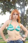 1girl bikini breasts cosplay large_breasts nami nami_(cosplay) nami_(one_piece) nami_(one_piece)_(cosplay) one_piece orange_hair photo solo swimsuit 