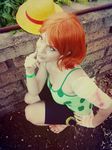  1_girl 1girl breasts camisole cosplay hot large_breasts nami nami_(cosplay) nami_(one_piece) nami_(one_piece)_(cosplay) one_piece orange_hair photo shorts solo 