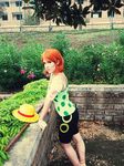  1girl breasts cosplay hot large_breasts nami nami_(cosplay) nami_(one_piece) nami_(one_piece)_(cosplay) one_piece orange_hair photo solo 